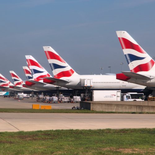 LONDON, UK - APRIL 16, 2014: British Airways Boeing 777s at London Heathrow airport. BA operates fleet of 283 aircraft (largest in the UK) and is largest operator of 747 with 55 aircraft (2014).