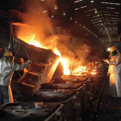 Photo of metal casting production in a warehouse